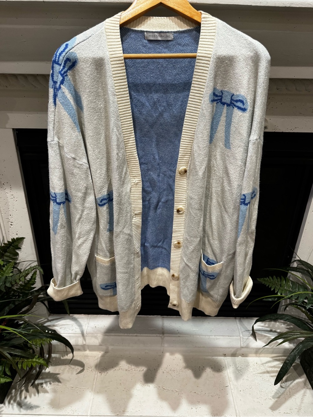 Cream Cardigan with Blue Bow Accents - Women's Open Knit Sweater
